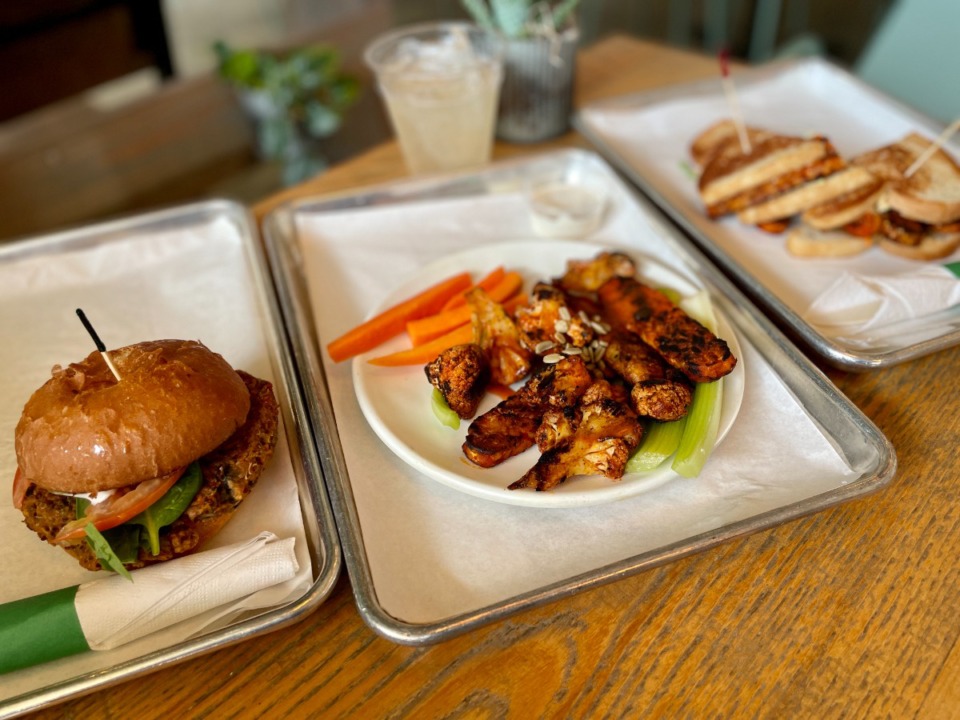 <strong>From left to right, the Silo burger, the cauliwings with tempeh and the four tempeh sandwich at City Silo.</strong> (Jennifer Biggs/The Daily Memphian)