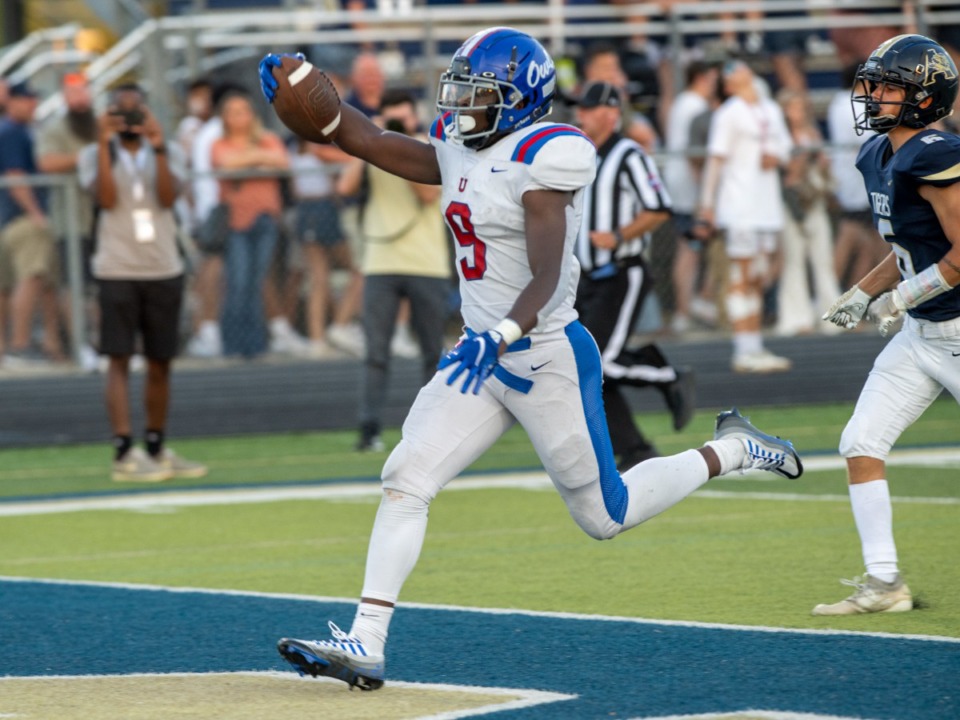 <strong>MUS running back Tee Perry (9) scores a touchdown against Arlington High School on Friday, Aug. 19, 2022.</strong> (Greg Campbell/Special to The Daily Memphian)