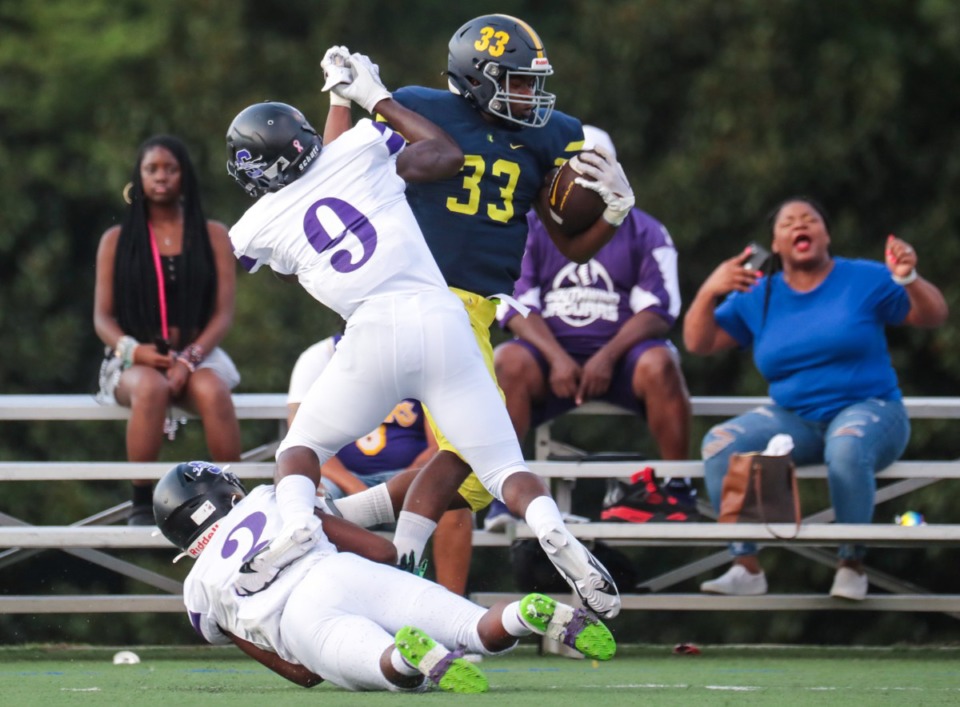 <strong>Lausanne running back Tyler Wilson (33) gets brought down by Southwind&rsquo;s defense after a long run on Aug. 19, 2022.</strong> (Patrick Lantrip/Daily Memphian)