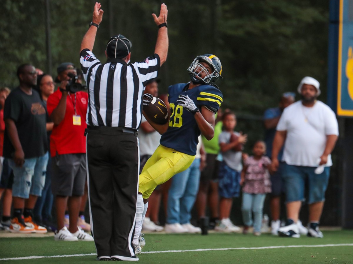 <strong>Lausanne receiver Michael Alfford (28) catches a touchdown pass during the Aug. 19, 2022, game against Southwind.</strong> (Patrick Lantrip/Daily Memphian)