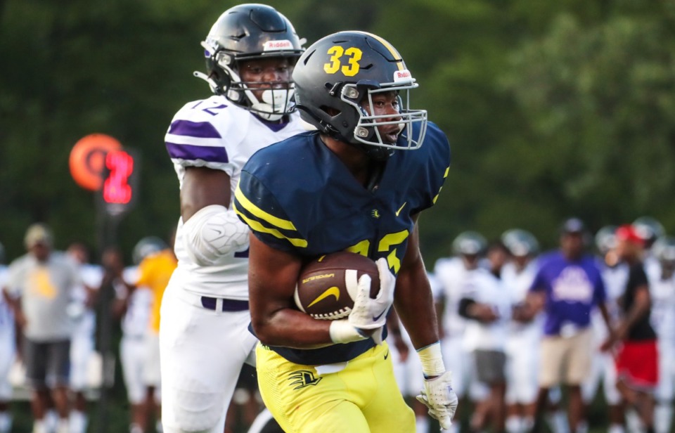 <strong>Lausanne running back Tyler Wilson (33) rushes the ball during the Aug. 19, 2022, game against Southwind.</strong> (Patrick Lantrip/Daily Memphian)