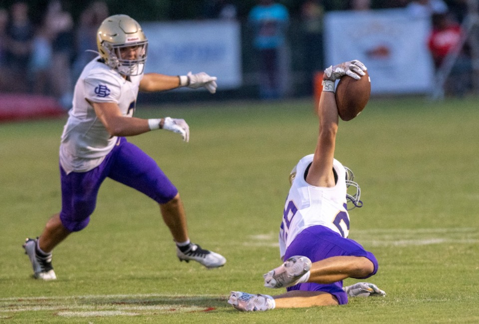 <strong>CBHS's Charlie Harrell snags his second interception in the second quarter of their game against Germantown at Germantown High School, Saturday, Aug. 20, 2022.</strong> (Greg Campbell/Special to The Daily Memphian)