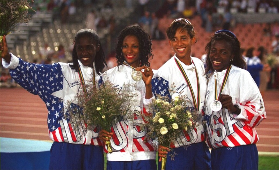 <strong>USA's 4 x 400-meter relay team celebrate their second place finish at the XXV Summer Olympics in Barcelona Saturday, August 8, 1992. Gwen Torrence, left, of Decatur, Georgia., Rochelle Stevens of Memphis, Natasha Kaiser of Des Moines, Iowa, and Jearl Miles, right of Gainesville, Florida, are shown after receiving their silver medals.</strong> (AP Photo/Eric Risberg)