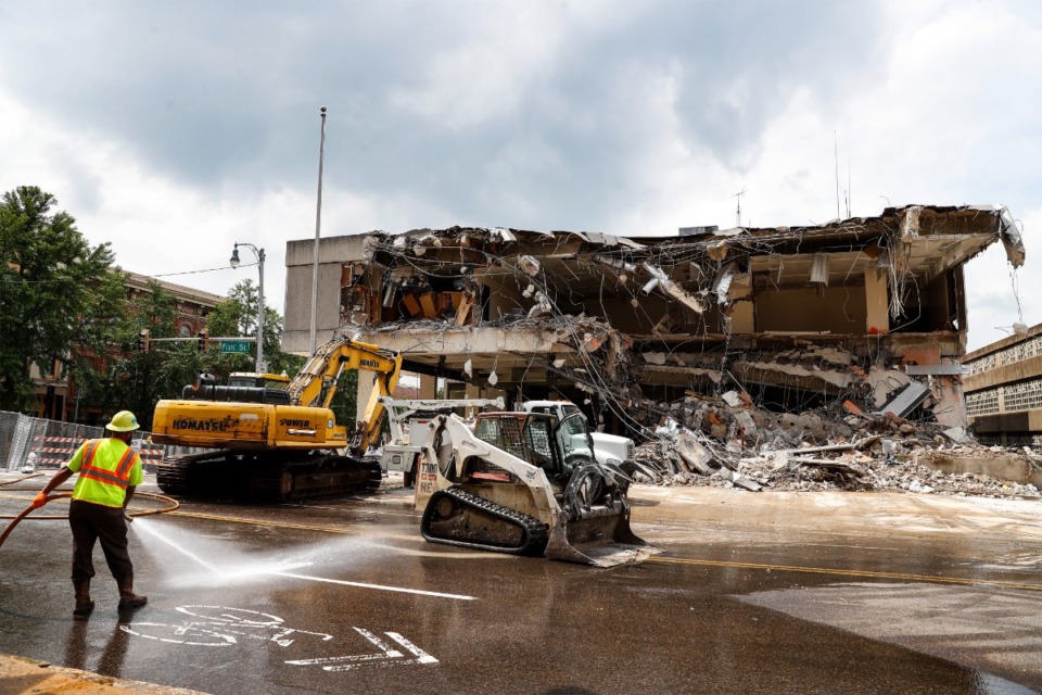 <strong>Demolition began Monday, Aug. 22, on the recently closed Memphis Fire Department station and headquarters at Union and Front. A new Memphis Brooks Museum of Art will be built on the site.</strong> (Mark Weber/The Daily Memphian)