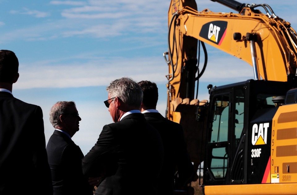 <strong>David Welch (second from left) and other executives with Memphis Global Crossing gather to celebrate the start of construction on a 421,000-square-foot warehouse in Southeast Memphis on Oct. 17, 2018.</strong> (Jim Weber/Daily Memphian file)