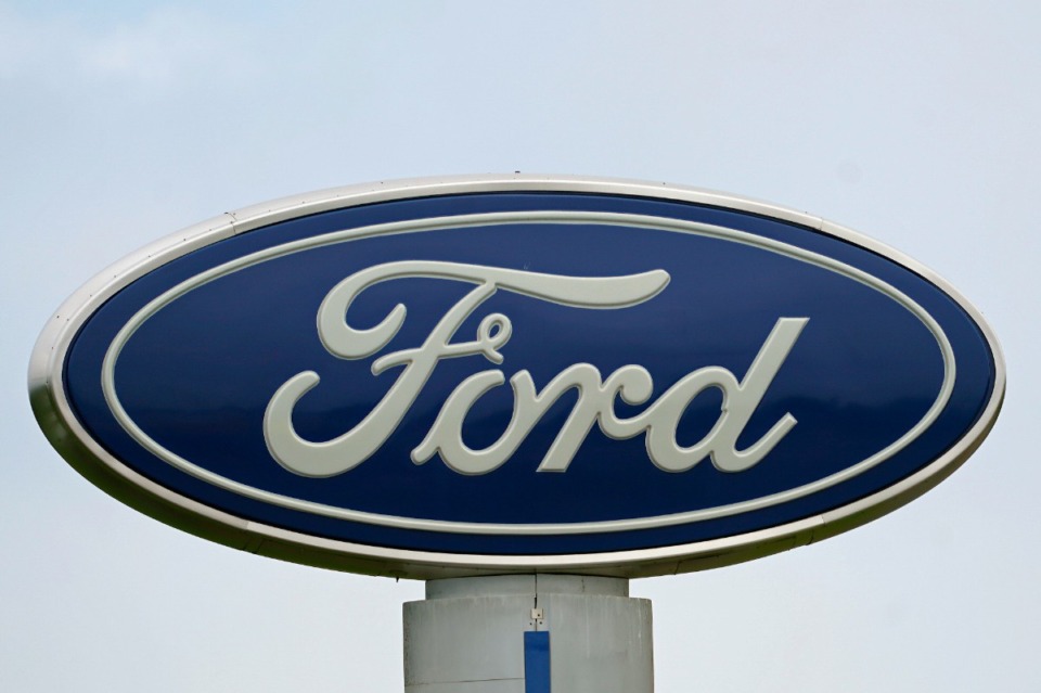 <strong>Ford Motor Co. is cutting about 3,000 white-collar workers as it moves reduce costs and make the transition from internal combustion to electric vehicles, leaders of the Dearborn, Mich., automaker announced Monday, Aug. 22, 2022, in a companywide email.</strong> (AP Photo/Gerry Broome, File)