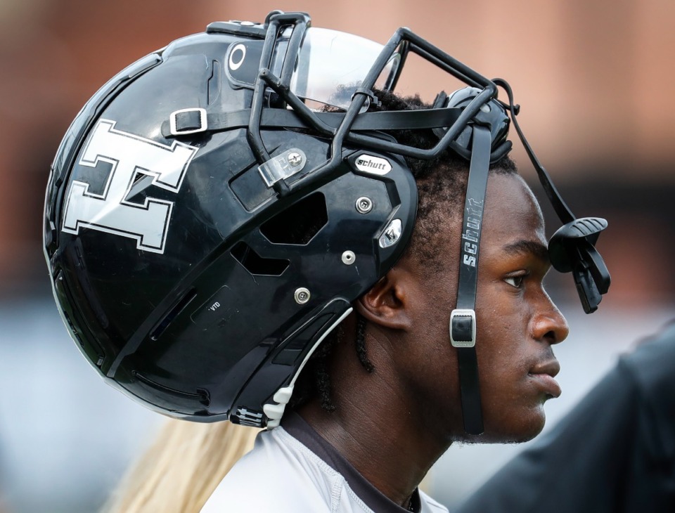<strong>Houston running back Damon Sisa adopts an unusual way to wear his helmet during practice on Monday, Aug. 22, 2022.</strong> (Mark Weber/The Daily Memphian)