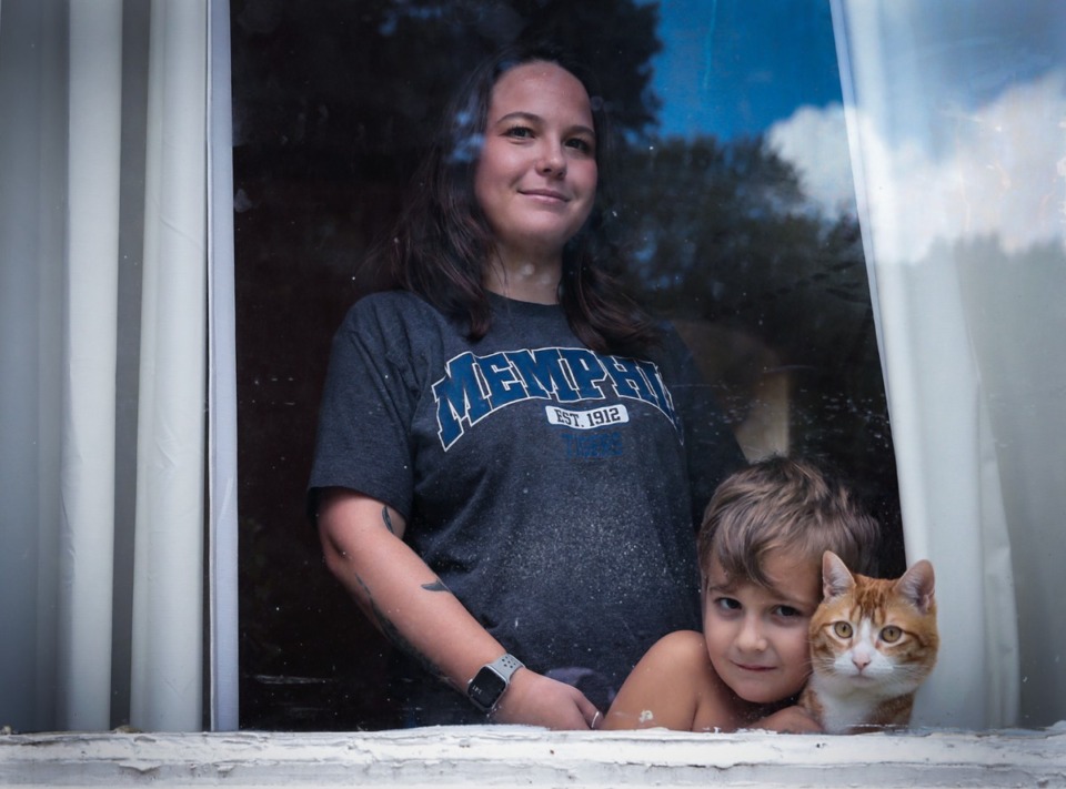 <strong>Sara Walker (with her son, Tristan Cook, and cat, Mitch) owes $30,000 in student loans for a degree she hasn&rsquo;t completed. But her debt could soon be reduced to $10,000.</strong>&nbsp;(Patrick Lantrip/Daily Memphian)