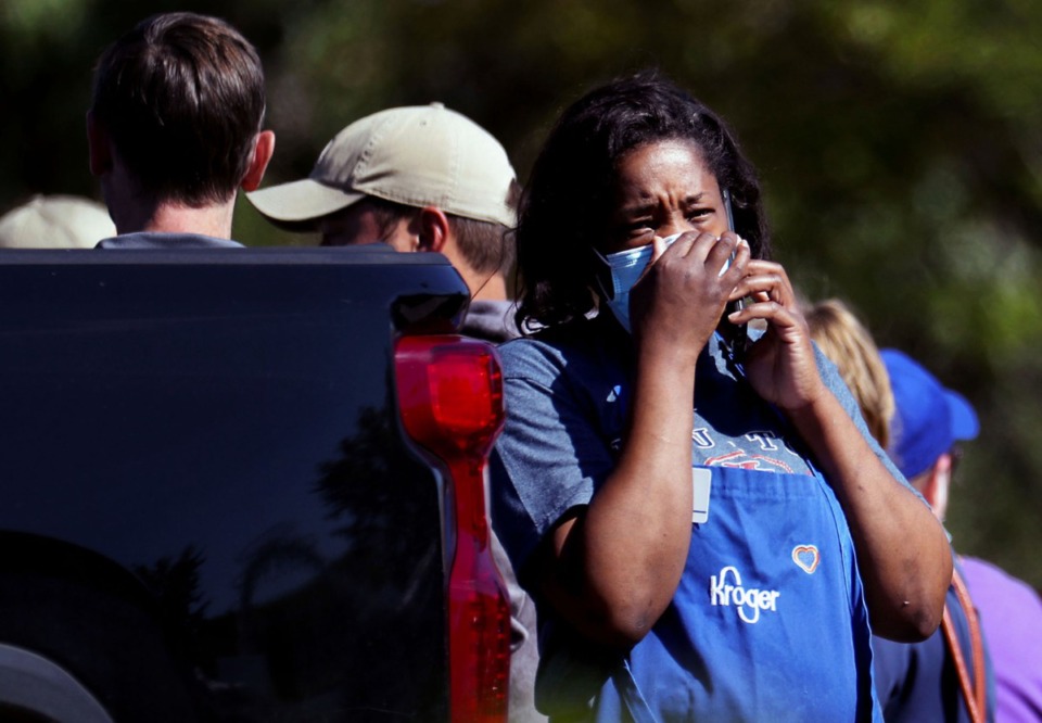 <strong>A survivor weeps after a mass shooting in the Kroger on Byhalia Road in Collierville. The shooter opened fire inside the busy grocery, killing one person and injuring 12 others before taking his own life Sept. 23, 2021.</strong> (Patrick Lantrip/The Daily Memphian)