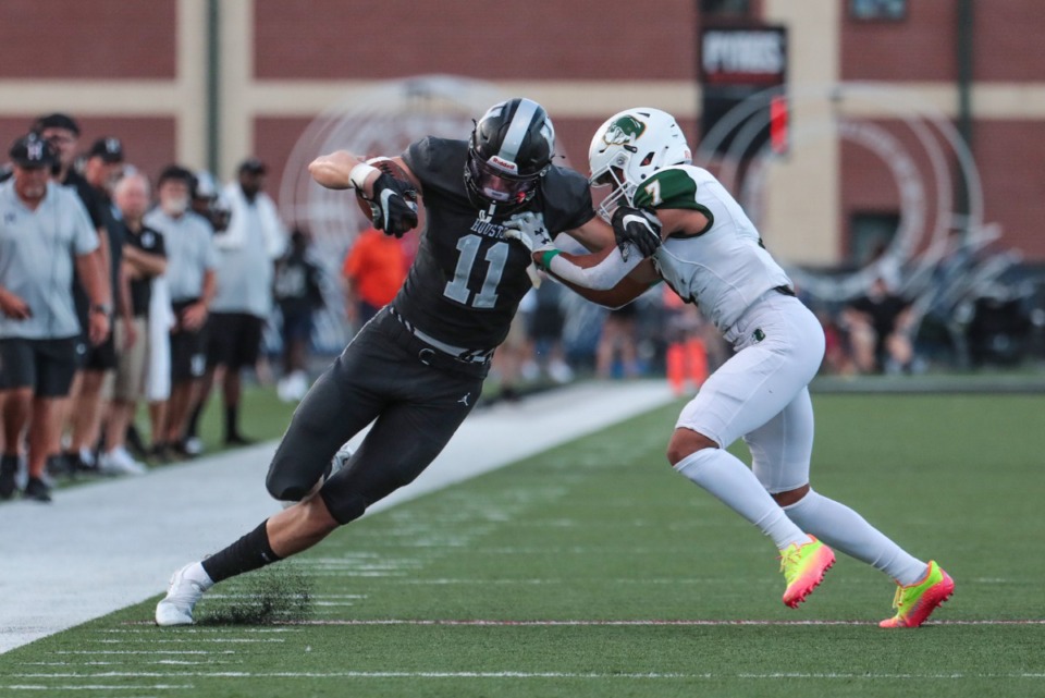 <strong>Houston receiver Brock Vice gets pushed out of bounds during the Aug. 26, 2022, game against Briarcrest.</strong> (Patrick Lantrip/Daily Memphian)