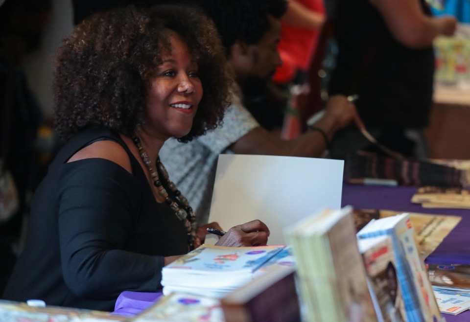 <strong>Ruby Bridges signs copies of her books at the Ruby Bridges Reading Festival held at the the National Civil Rights Museum.&nbsp;Bridges was the first Black child to attend&nbsp;&nbsp;William Frantz Elementary School in New Orleans.&nbsp;</strong>(Patrick Lantrip/The Daily Memphian)