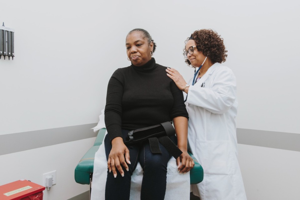 <strong>Dr. Sheila Thomas checks Catina Williams' vitals at Church Health in Crosstown Concourse in 2018.</strong> (Houston Cofield/Daily Memphian file)