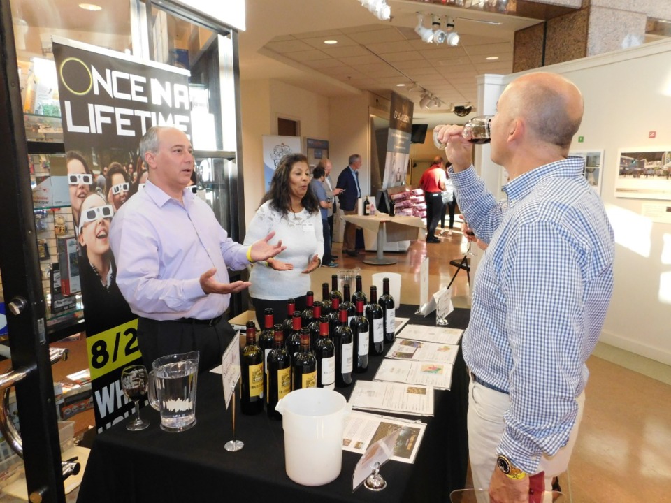 <strong>A patron enjoys the wine tasting at the&nbsp; Museum of Science and History&rsquo;s&nbsp; Science of Wine event in 2017. The event returns Sept. 9.</strong>&nbsp;(Museum of Science &amp; History)
