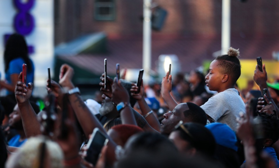 <strong>Fans record rapper Big Boogie while he is performing at the 901 Day Grizz Bash held outside FedExForum on Sept. 1, 2022.</strong> (Patrick Lantrip/Daily Memphian)