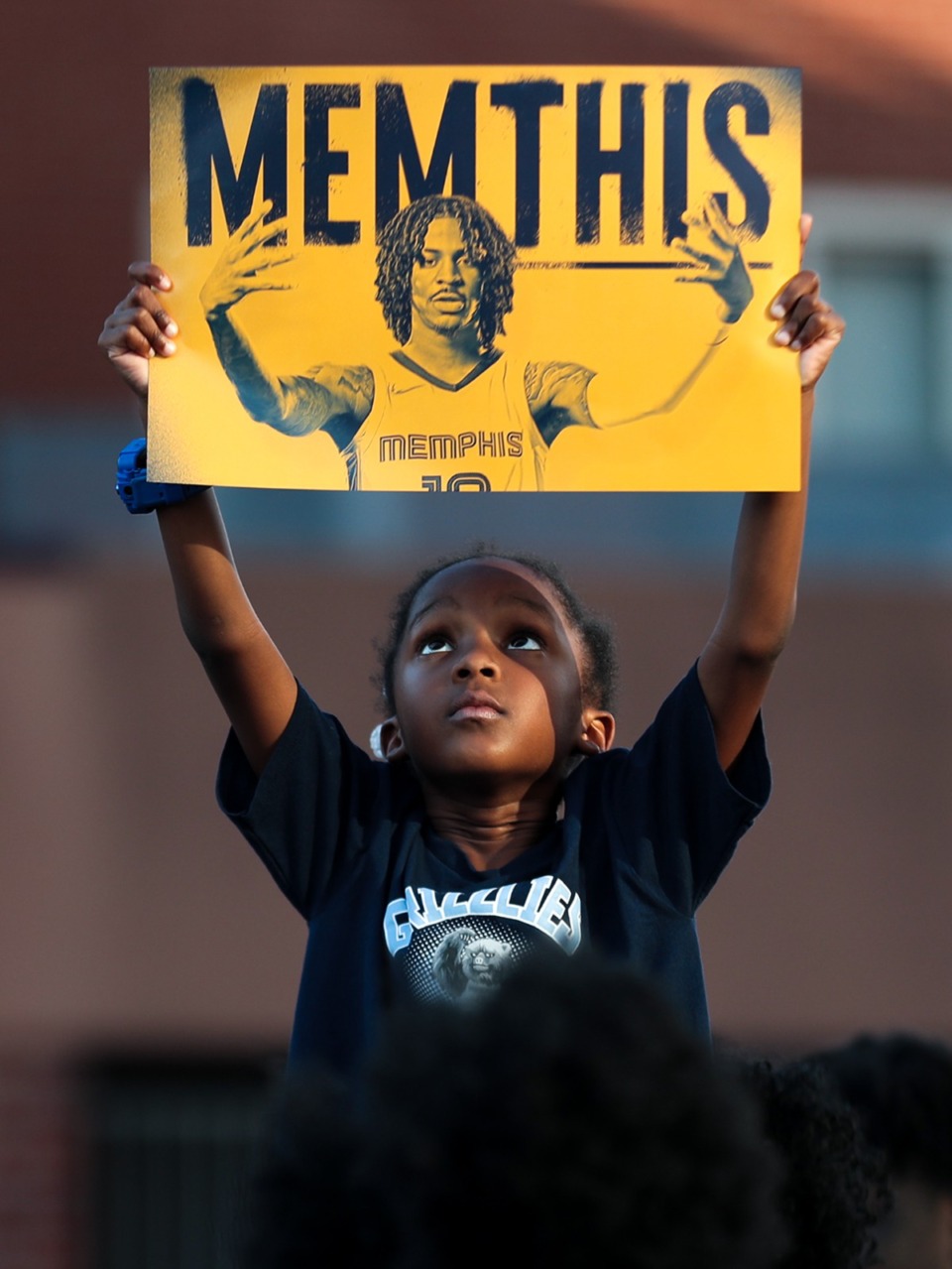 <strong>Fans held up Ja Morant signs during the 901 Day Grizz Bash held outside of FedExForum on Sept. 1, 2022.</strong> (Patrick Lantrip/Daily Memphian)