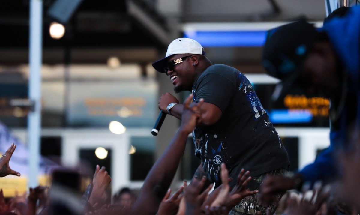 <strong>Duke Deuce shakes hands with fans during the 901 Day Grizz Bash held outside of FedExForum on Sept. 1, 2022.</strong> (Patrick Lantrip/Daily Memphian)