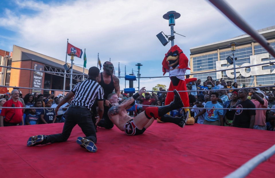 <strong>Rockey the Redbird watches in dismay during a wrestling match at the 901 Day Grizz Bash held outside of FedExForum on Sept. 1, 2022.</strong> (Patrick Lantrip/Daily Memphian)