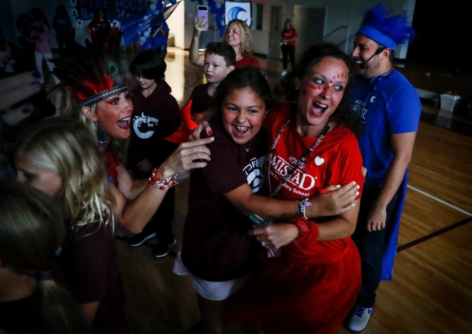 <strong>Collierville Elementary fifth graders celebrate with their teachers after finding out house assignments on Friday, Sept. 2, 2022.</strong> (Mark Weber/The Daily Memphian)