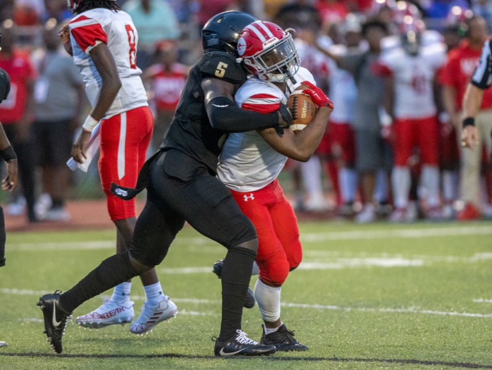 <strong>Whitehaven's Mahamadou Diarra smothers Germantown's Joshua Davis at Whitehaven High School on Friday, Sept. 2, 2022.</strong> (Greg Campbell/Special to The Daily Memphian)