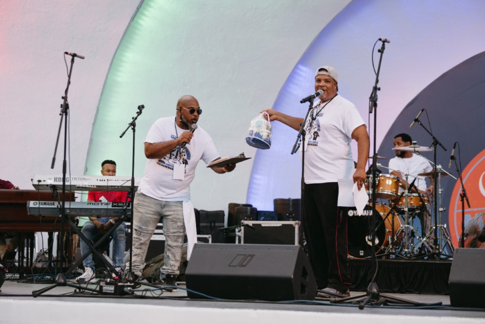 <strong>Emcees Marcus Mason (left) and Chip Washington did giveaways between performances., Saturday, Sept 3, 2022 at the Overton Park Shell.</strong> (Lucy Garrett/Special to The Daily Memphian)