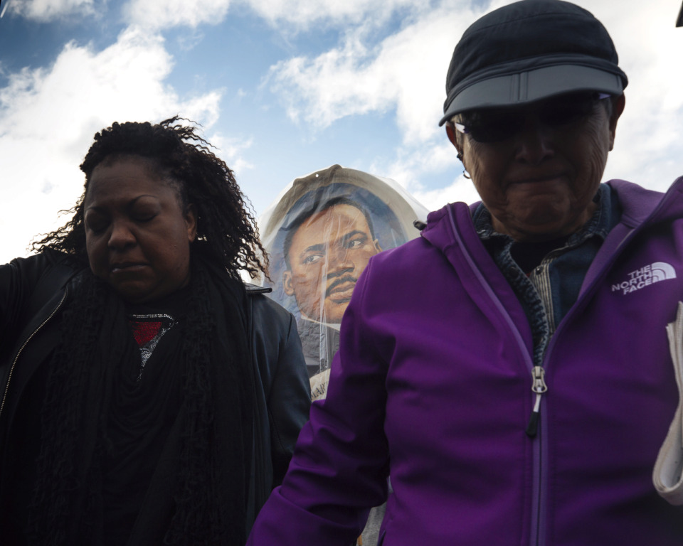<strong>Visitors observe a moment of silence in front of the National Civil Rights Museum on April 4, 2019, at the observance of the 51st anniversary of Dr. Martin Luther King Jr.&rsquo;s assassination in Downtown Memphis.</strong> (Ziggy Mack/Special to The Daily Memphian)