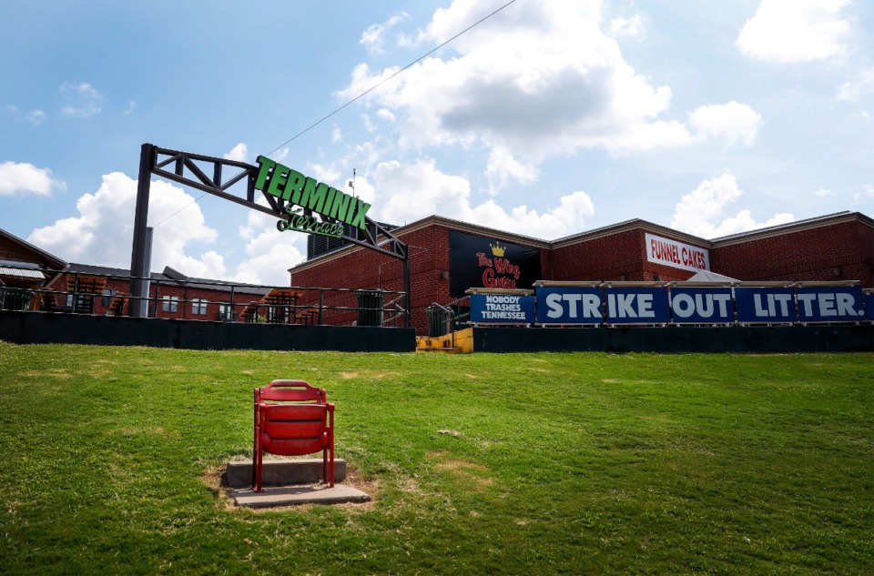 <strong>A red stadium chair, alone in right field at AutoZone Park, commemorates a 13th-inning walk-off home run by former Memphis Redbird Albert Pujols in 2000.</strong> (Mark Weber/The Daily Memphian)