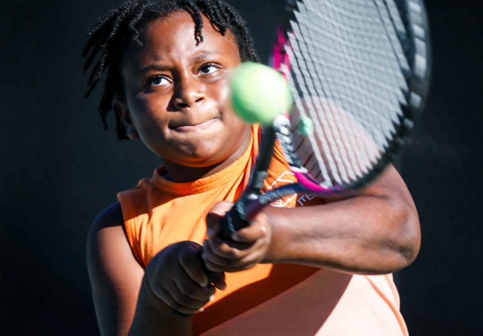 <strong>Mary Freeman, 10, hits a forehand shot during tennis class offered by Tennis Memphis at Bellevue Tennis Center.&nbsp;Upcoming sessions are set for Glenview and University parks.</strong> (Mark Weber/The Daily Memphian)