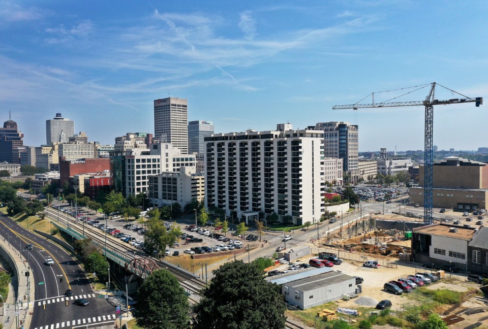 <strong>A crane hovers over a construction site in Downtown Memphis in 2021.</strong>&nbsp;<strong>Memphis set a homicide record in 2021, breaking a record set in 2020.</strong> (Patrick Lantrip/Daily Memphian file)&nbsp;