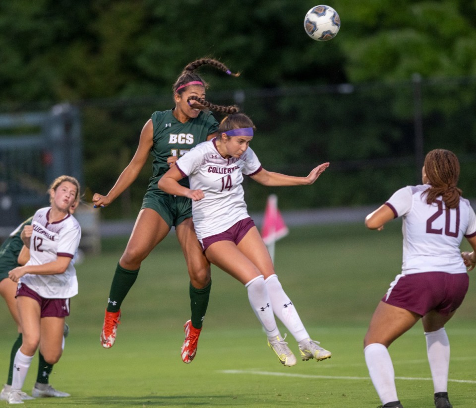 <strong>Collierville's Cameron Ewing and Briarcrest's Ali Howard maneuver to head the ball during the contest at Briarcrest Christian School Thursday, Sept. 8, 2022.</strong> (Greg Campbell/Special to The Daily Memphian)