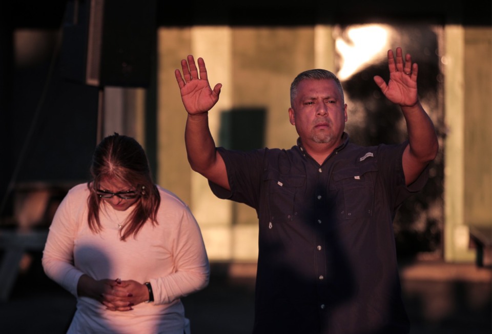 <strong>Rolando Rostero speaks to a crowd of people gathered for a vigil on Sept. 8 to mourn the victims of the shooting spree the day before.</strong> (Patrick Lantrip/Daily Memphian)