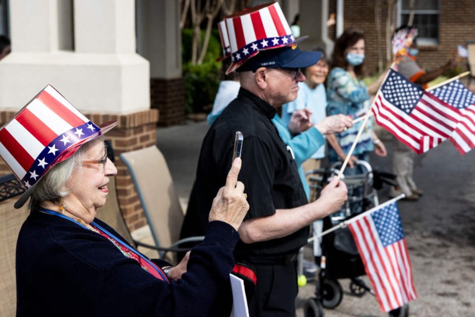 <strong>Residents and workers stood outside and waved during a salute to First Responders at Ave Maria and St. Clare Rehab in Bartlett Sept. 9, 2022.</strong> (Brad Vest/Special to The Daily Memphian)