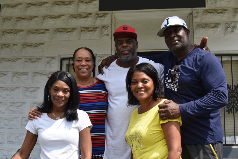 <strong>Richard Clark&rsquo;s relatives stand in front of his home in South Memphis where he spent his entire life. Clark was one of the victims in Wednesday&rsquo;s violent shooting spree across the city. Front row from left: Clark&rsquo;s nieces Sherelle Lenzy and Sharmeen Miller. Back row fom left: Clark&rsquo;s sister Sheila Finley, and nephews Stephen Miller and Aubrey Miller.</strong> (Ben Wheeler/The Daily Memphian)