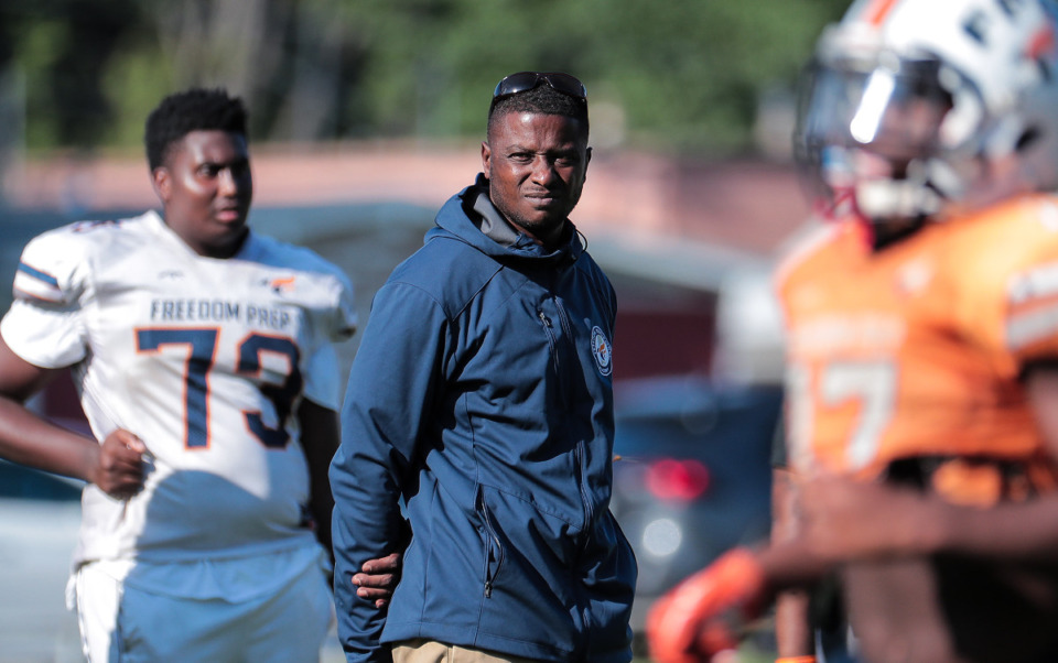 <strong>Freedom Prep coach Jerald Cook watches his team practice, Sept. 7, 2022.</strong> <strong>Freedom Prep's defense is the top-ranked defense in the Memphis area.</strong> (Patrick Lantrip/Daily Memphian file)