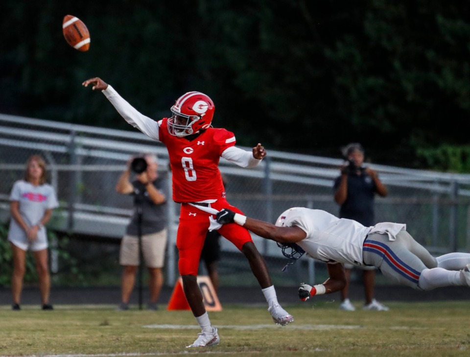 <strong>Germantown quarterback Isaiah Tate (left) throws a pass against Bartlett on Friday, Sept. 16, 2022.</strong> (Mark Weber/The Daily Memphian)