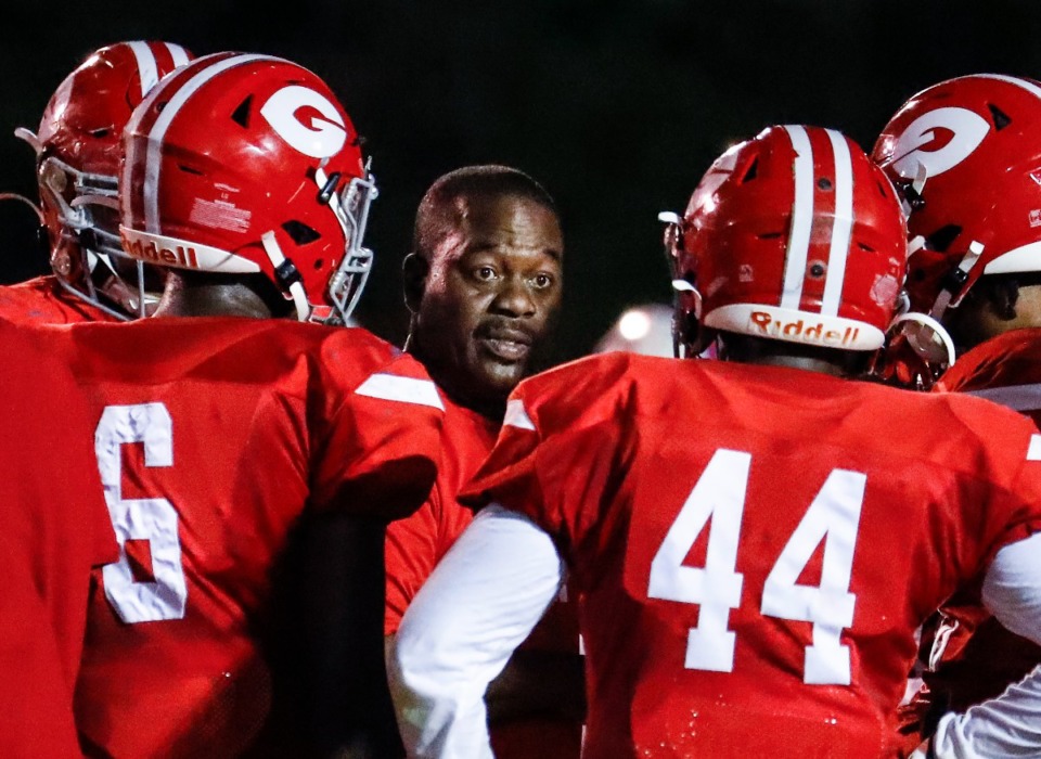 <strong>Germantown head coach Errol Harmon (middle) huddles with his team during the game against Bartlett on Friday, Sept. 16, 2022.</strong> (Mark Weber/The Daily Memphian)