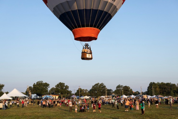 <strong>Participants and spectators gathered around dawn to view the ascension of more than 20 hot-air balloons as the Collierville Balloon Festival kicked off Saturday, Sept. 17.</strong> (Brad Vest/Special to The Daily Memphian)