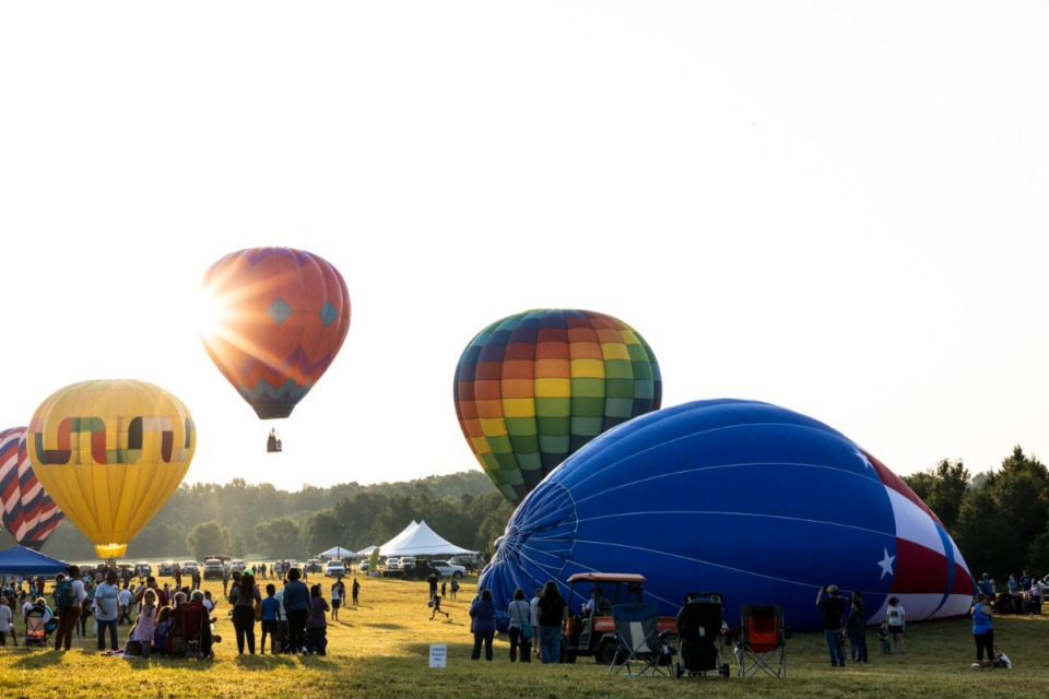 <strong>Scenes from the dawn ascension of participating hot air balloons at the Collierville Balloon Festival on Sept. 17, 2022. The festival is on Maynard Way in Collierville.</strong> (Brad Vest/Specual to The Daily Memphian)
