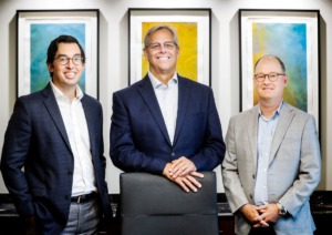 <strong>Tim Ellis (left) and Greg Davis (right) are chief investment officers for RBG Wealth Advisors, an arm of CPA firm Reynolds, Bone &amp; Griesbeck. Skeet Haag (center), a managing partner with Reynolds, Bone &amp; Griesbeck, said &ldquo;Greg and Tim know our core values and our firm and have worked with us for several years.&rdquo;</strong> (Mark Weber/The Daily Memphian)