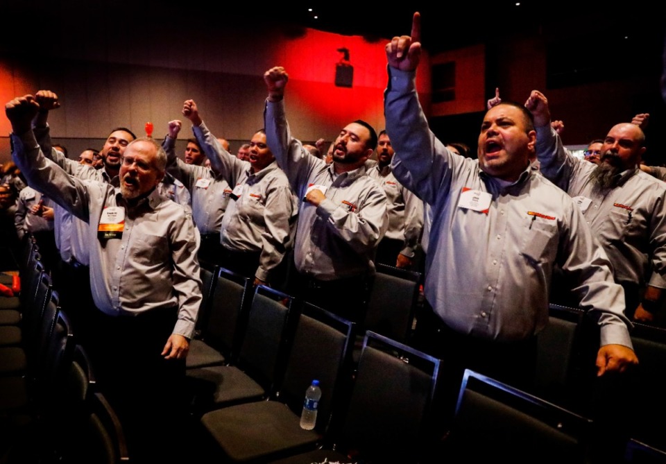 <strong>AutoZone staff members chant the company motto at their annual national sales meeting on Thursday, Sept. 22, 2022 at the Renasant Convention Center.</strong> (Mark Weber/The Daily Memphian)