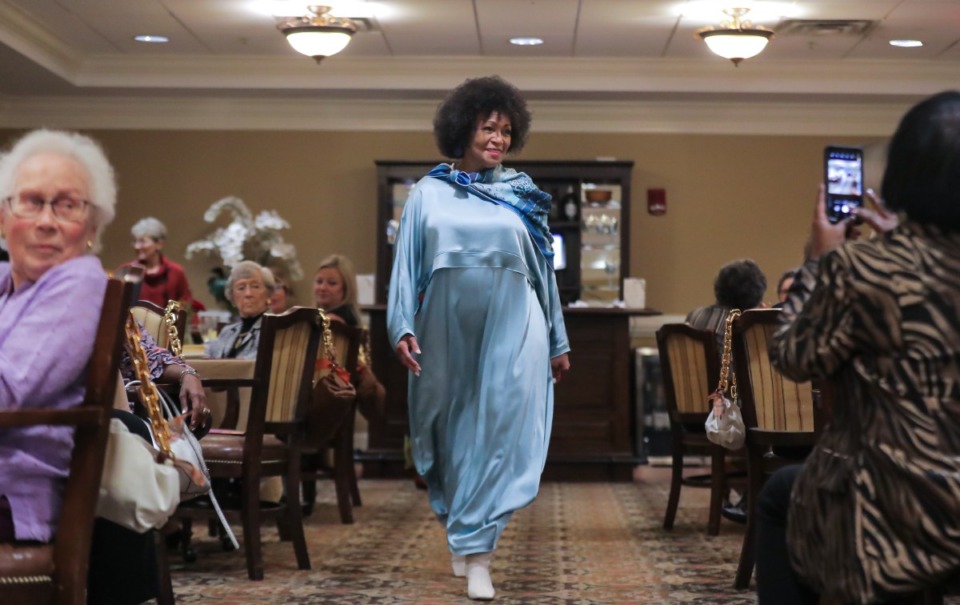 <strong>Estella Mayhue-Greer shows off clothes from Coming Attractions Boutique at the Celebrating Fashions at Trezevant show Sept. 22, 2022.</strong> (Patrick Lantrip/The Daily Memphian)