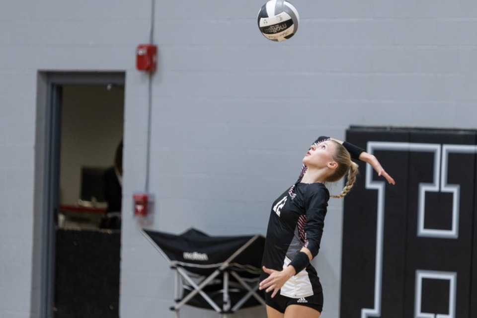 <strong>Collierville&rsquo;s Abbi Peterson serves the ball during Thursday night&rsquo;s match against Houston.&nbsp;</strong>(Brad Vest/Special to The Daily Memphian)