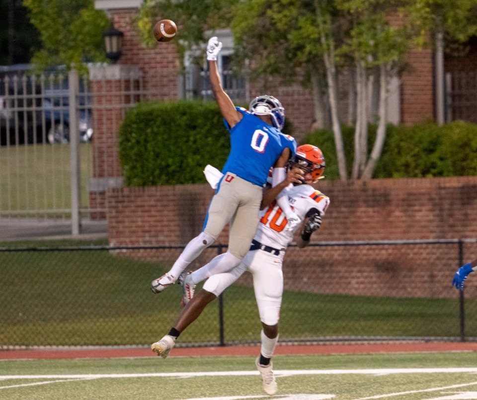 <strong>MUS defensive back Brandon Nicholson defends against Ridgeway High's Brian Carter as the pass goes out of reach.&nbsp;</strong>(Greg Campbell/Special to The Daily Memphian)