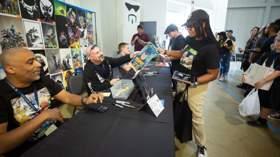 <strong>Comic artists (left to right,) Jonathan Glapion, Greg Capullo and Scott Snyder greet fans during Memphis Comic Expo at Agricenter International on Saturday, Sept. 24, 2022.</strong> (Ziggy Mack/Special to The Daily Memphian)