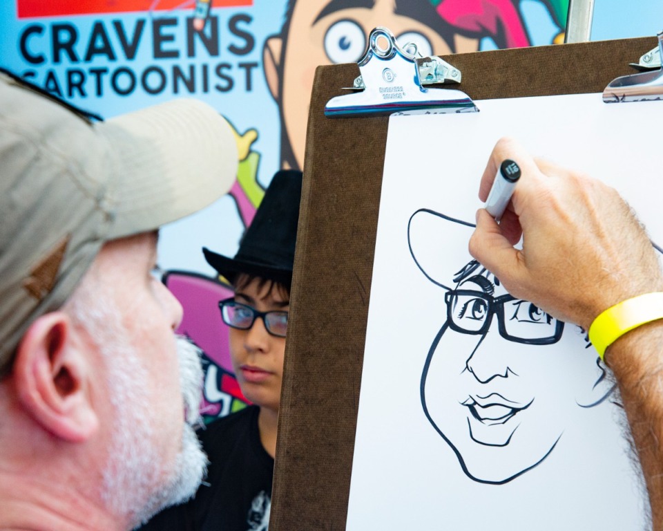 <strong>Cartoonist Greg Cravens sketches an image during Memphis Comic Expo, Saturday, Sept. 24, 2022 at Agricenter International.</strong> (Ziggy Mack/Special to The Daily Memphian)