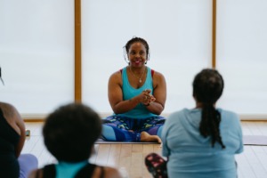 <strong>Freedom at The Mat founder Olivia F. Scott leads the class in a yoga exercise and journaling during the Freedom of The Soul event Sunday, Sept. 25, 2022 at Collage Dance Collective at 505 Tillman St.</strong> (Lucy Garrett/Special to The Daily Memphian)