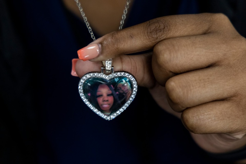 <strong>Erryn Bell shows a necklace with a picture of her and her brother, Cameron Gholson, who was shot and killed in Memphis in October of 2021.</strong> (Brad Vest/Special to The Daily Memphian file)&nbsp;