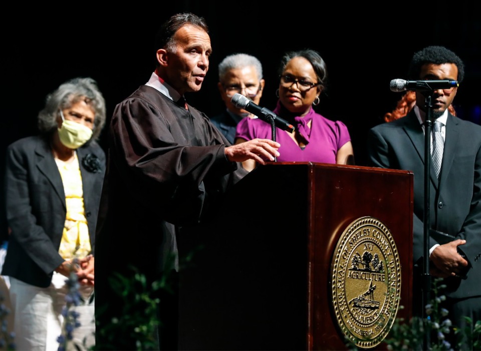 <strong>Juvenile Court Judge Tarik Sugarmon (middle) takes the oath of office on Wednesday, Aug. 31, 2022.&nbsp;A Judicial Commission position was created when Sugarmaon named one of the existing commissioners to the Memphis-Shelby County Juvenile Court.</strong> (Mark Weber/The Daily Memphian file)