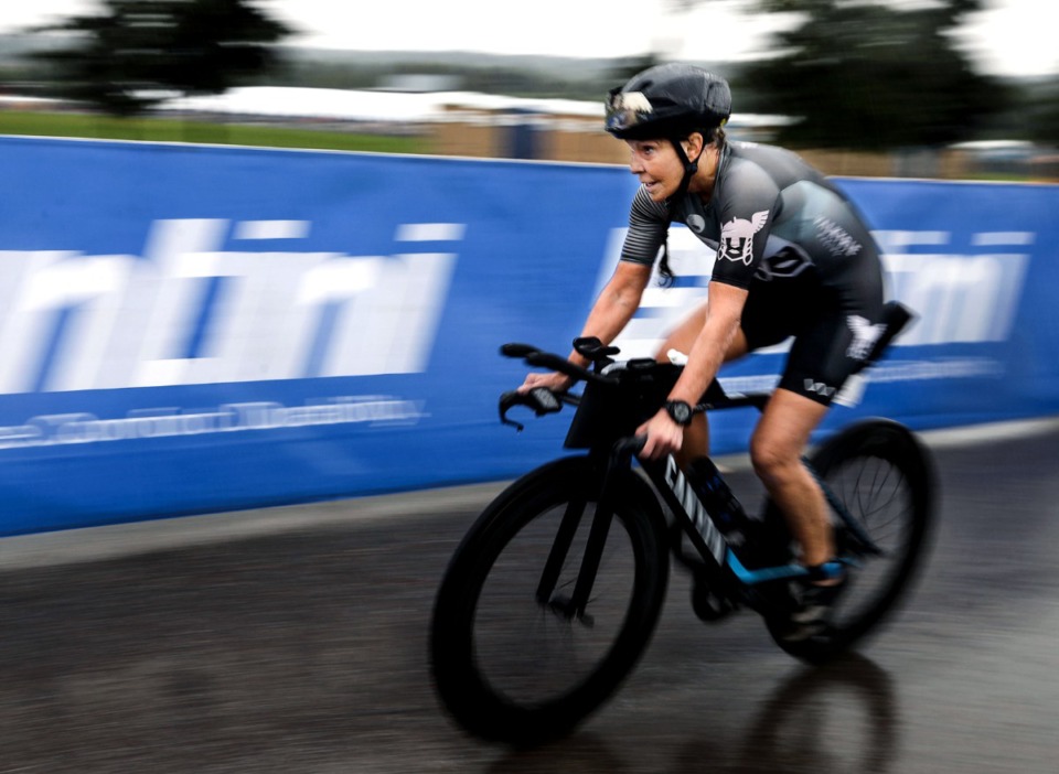 <strong>A biker whizzes by during the second leg of the 2021 St.Jude IRONMAN 70.3 Memphis race at Shelby Farms. Drivers should expect road closures for this Saturday&rsquo;s race.</strong> (Patrick Lantrip/The Daily Memphian file)