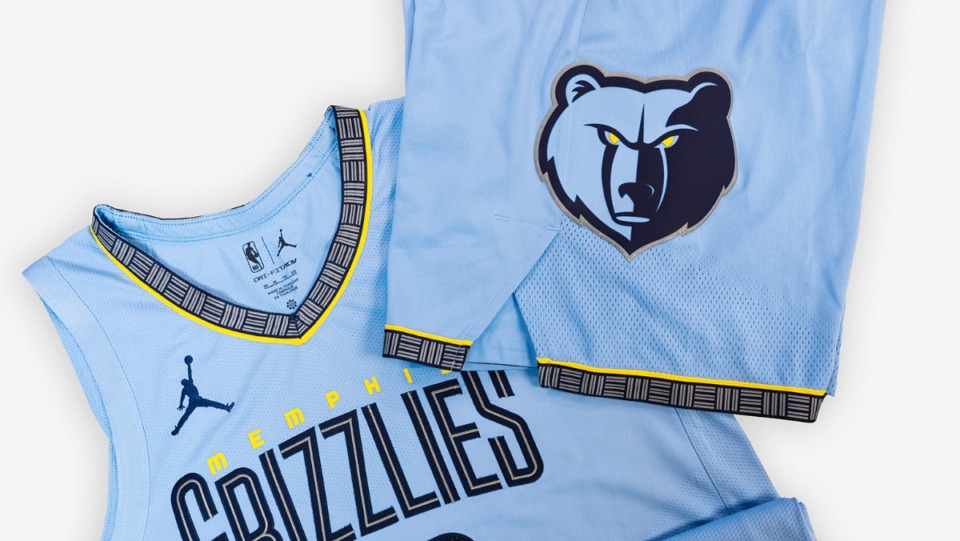 <strong>The Memphis Grizzlies released their updated&nbsp;&ldquo;Statement&rdquo; uniforms on Friday, Sept. 30, making a few tweaks to their typical baby blue jerseys. The updated version features a larger&nbsp;&ldquo;Grizzlies&rdquo; text on the front, with&nbsp;&ldquo;Memphis&rdquo; in yellow lettering above it. It also has a asymmetrical stripe down one side and the collar with gray &ldquo;MEM&rdquo; text that has been featured on previous statement uniforms.</strong> (Courtesy Memphis Grizzlies)