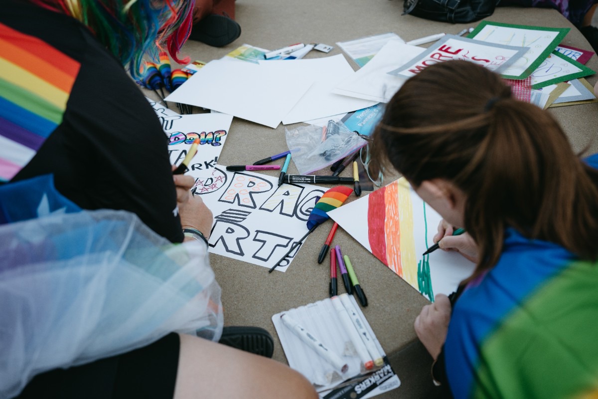 <strong>Attendees make their own signs at the LGBTQ rights march on Sept. 30, which followed cancellation of a drag show at the Museum of Science &amp; History on Sept. 23.</strong> (Lucy Garrett/Special to The Daily Memphian)